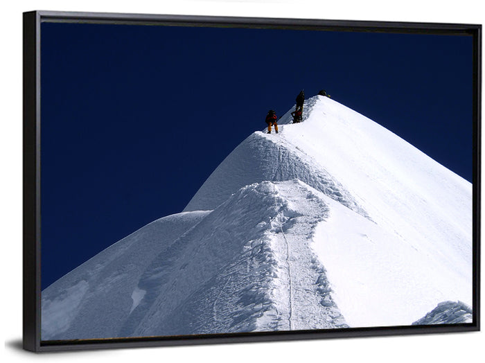 Climbers on a Snowy Himalayan Peak Wall Art as a framed canvas
