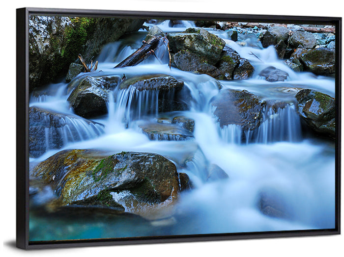 Mossy Rock Stream with Silky Waterfall Wall Art as a framed canvas