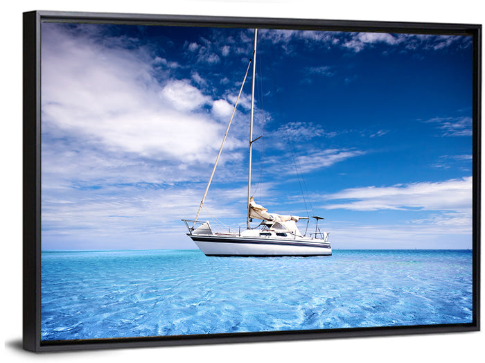 Furled Sails Over Turquoise Water Wall Art as a framed canvas