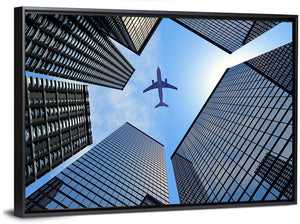 Airplane Above Skyscrapers Wall Art