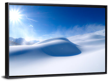 Sunlit Snow Dune Under Blue Sky Wall Art