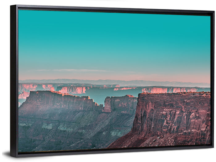Sunlit Canyon Rim at Dusk Wall Art as a framed canvas