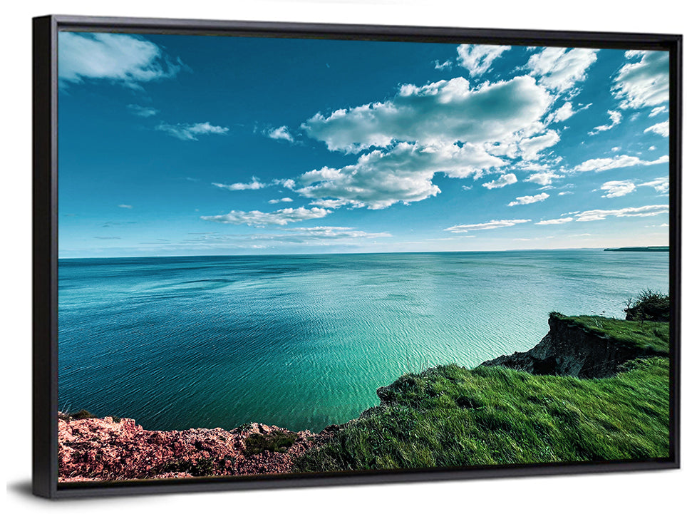 Coastal Cliffs Above a Turquoise Sea Wall Art