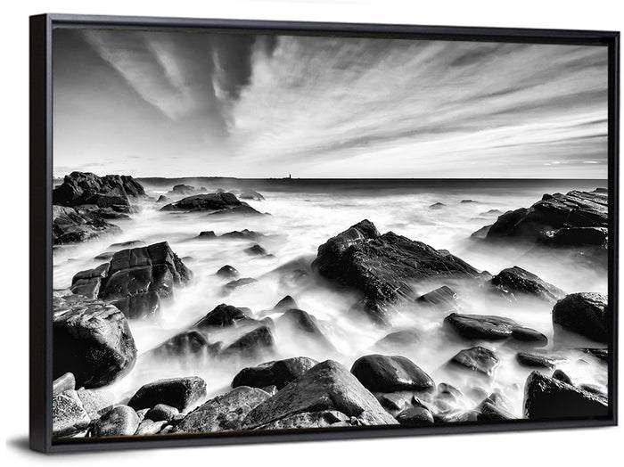 Maine Rocky Coast with Distant Lighthouse Wall Art as a framed canvas