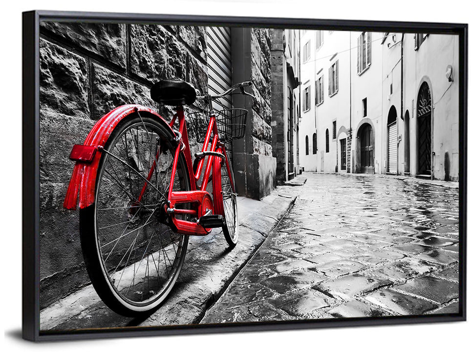 Red Bicycle on Rainy Cobblestone Street Wall Art