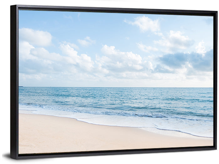 Minimalist Sandy Beach and Gentle Waves Wall Art as a framed canvas