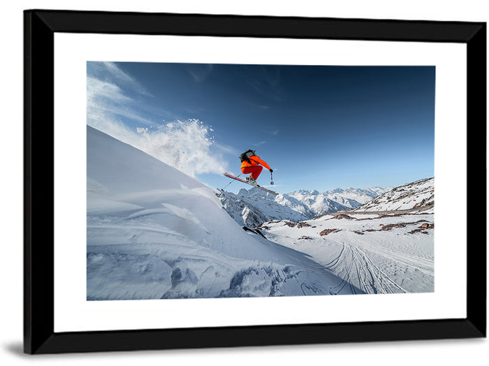 Airborne Skier Over Snowy Mountains Wall Art as a framed print