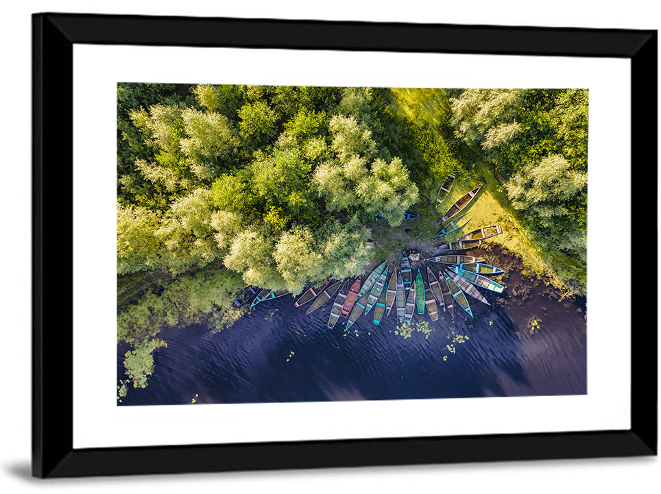 Cluster of Boats Along Forest Shore Wall Art
