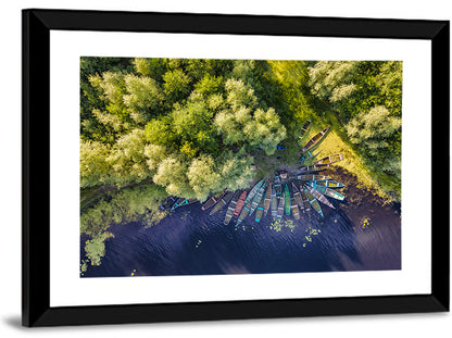 Cluster of Boats Along Forest Shore Wall Art