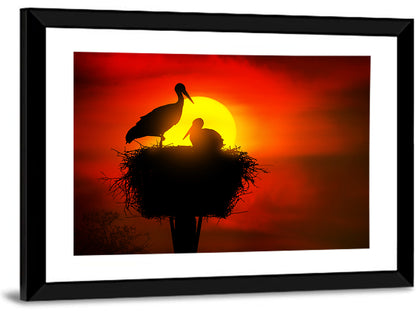 Storks in Nest at Sunset Wall Art