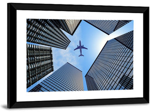 Airplane Above Skyscrapers Wall Art