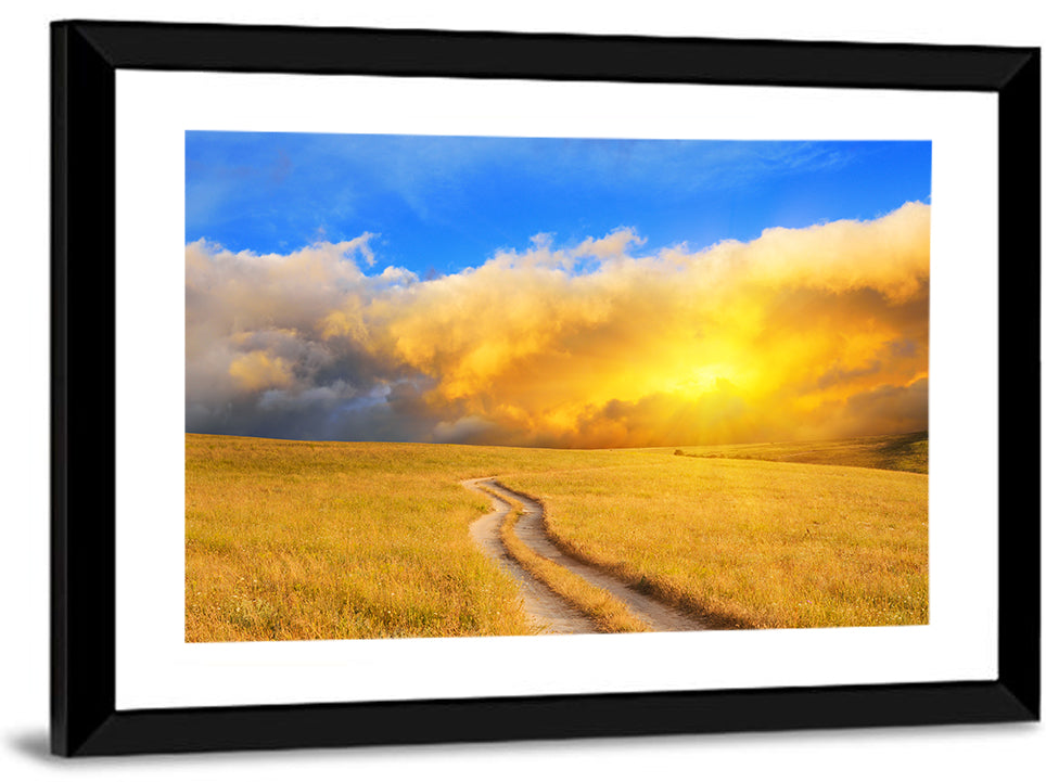 Sunlit Meadow Path with Dramatic Clouds Wall Art