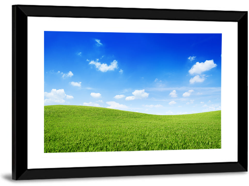 Rolling Green Meadow Under Blue Sky Wall Art