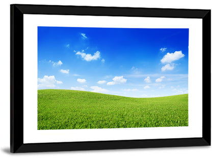 Rolling Green Meadow Under Blue Sky Wall Art
