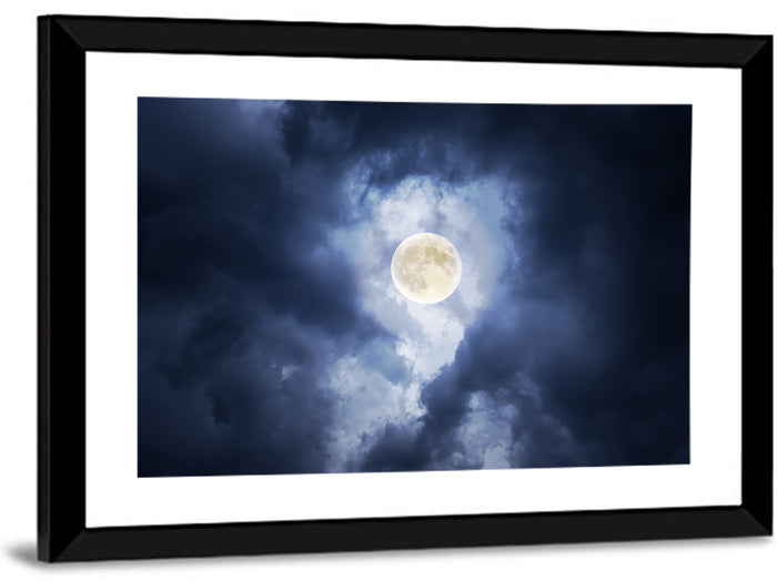 Supermoon Through Storm Clouds Wall Art as a framed print