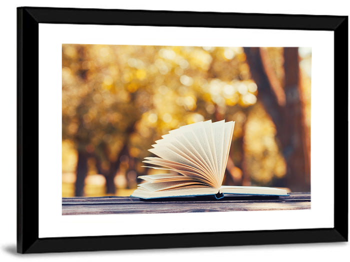 Open Book in Golden Autumn Light Wall Art as a framed print