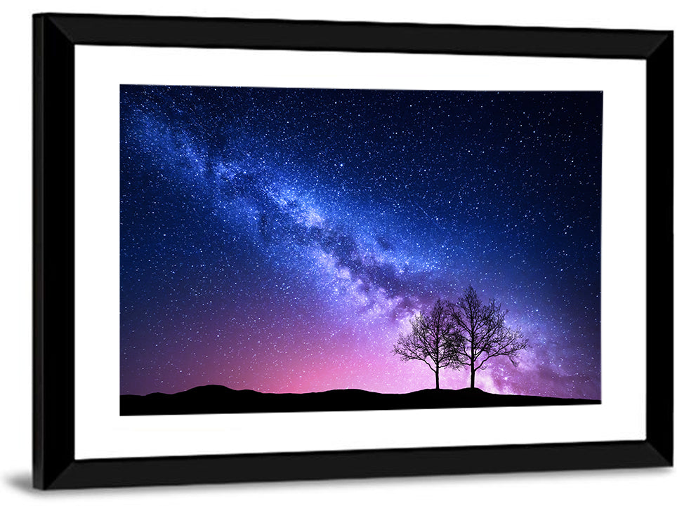 Milky Way Nebula Sky with Silhouetted Trees Wall Art