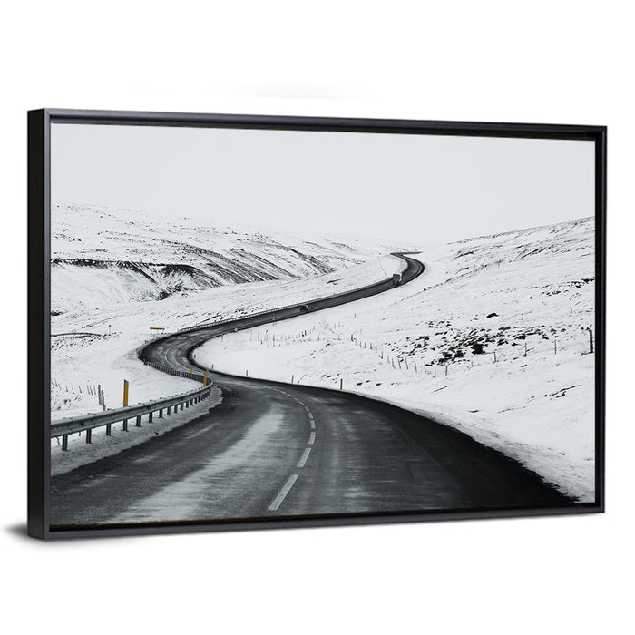 Winding Snow Road with Yellow Markers Wall Art as a framed canvas