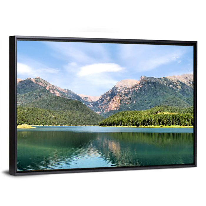 Mission Mountain Lake Reflection Wall Art as a framed canvas