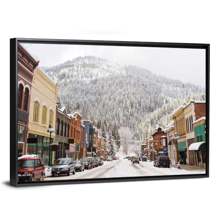 Snow Covered Mountain Main Street Wall Art as a framed canvas