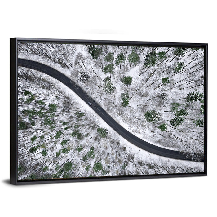 Snowy Forest Road Wall Art as a framed canvas