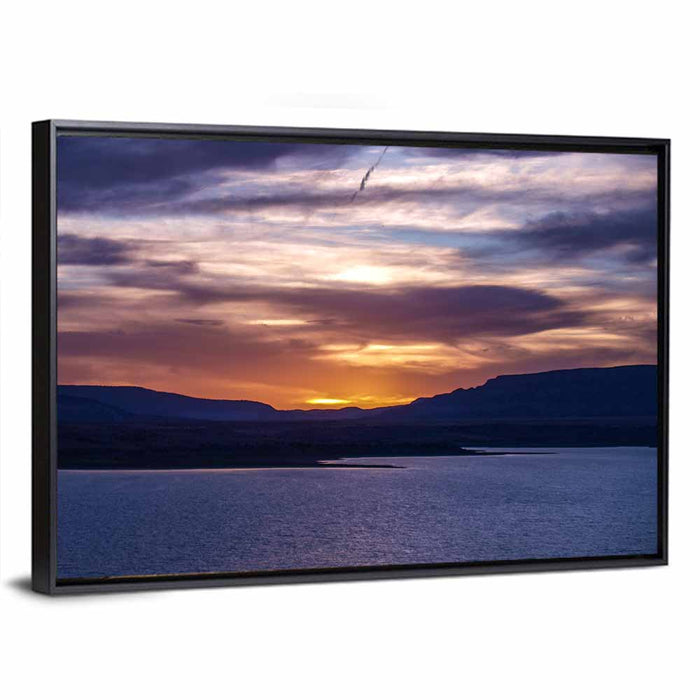 Abiquiu Lake Sunset Glow Wall Art as a framed canvas