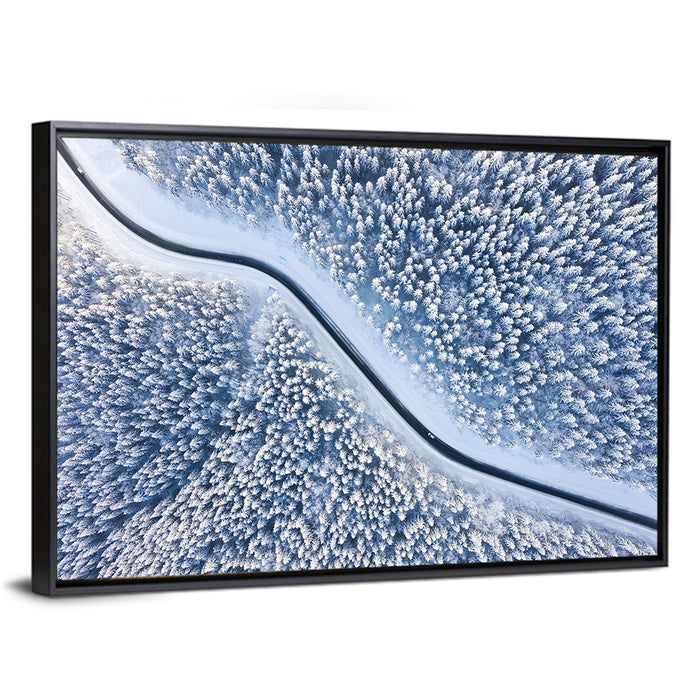 Winding Snowy Forest Road Wall Art as a framed canvas