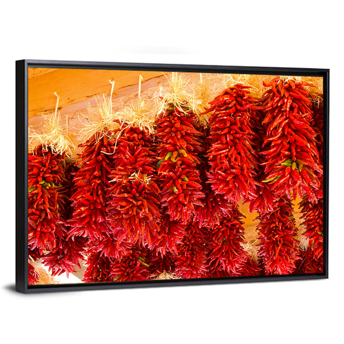 Hanging Dried Chili Peppers Wall Art as a framed canvas