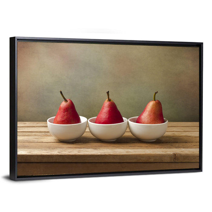 Three Red Pears in Bowls Wall Art as a framed canvas