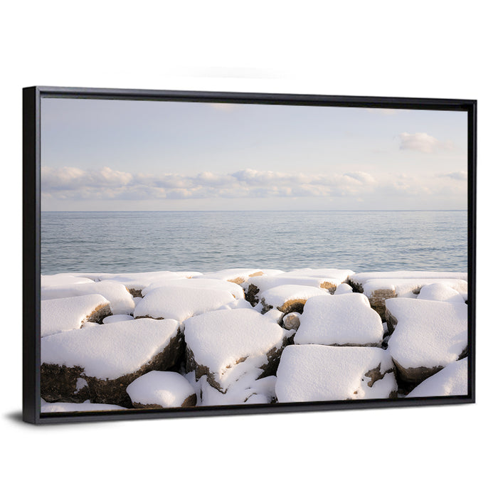 Lake Ontario Snowy Rocks Wall Art as a framed canvas