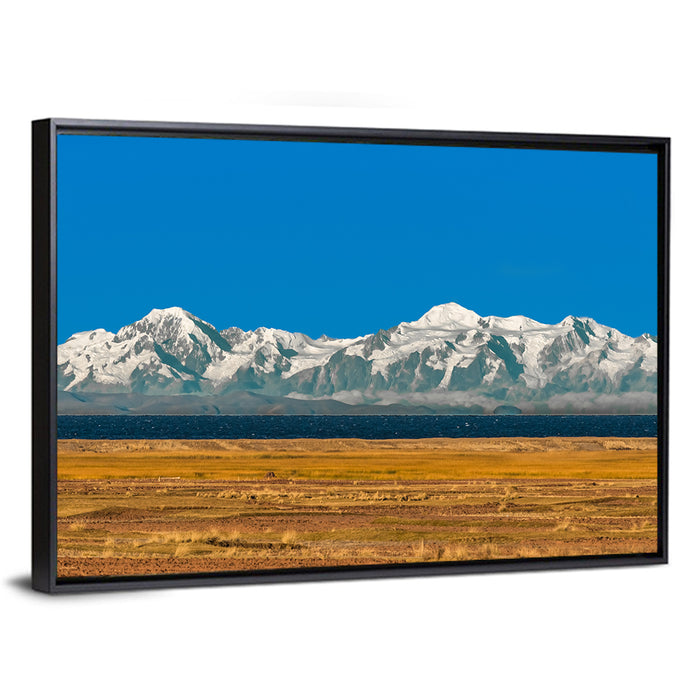 Snow-capped Peaks Over Lake Titicaca Wall Art as a framed canvas