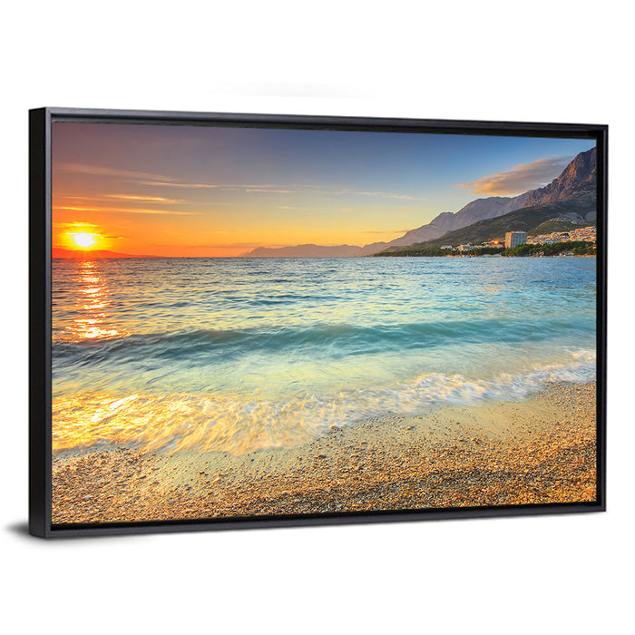Makarska Pebble Beach Sunset Wall Art as a framed canvas