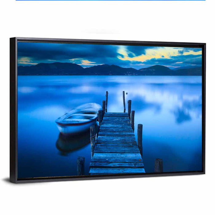 Boat and Wooden Pier Wall Art as a framed canvas