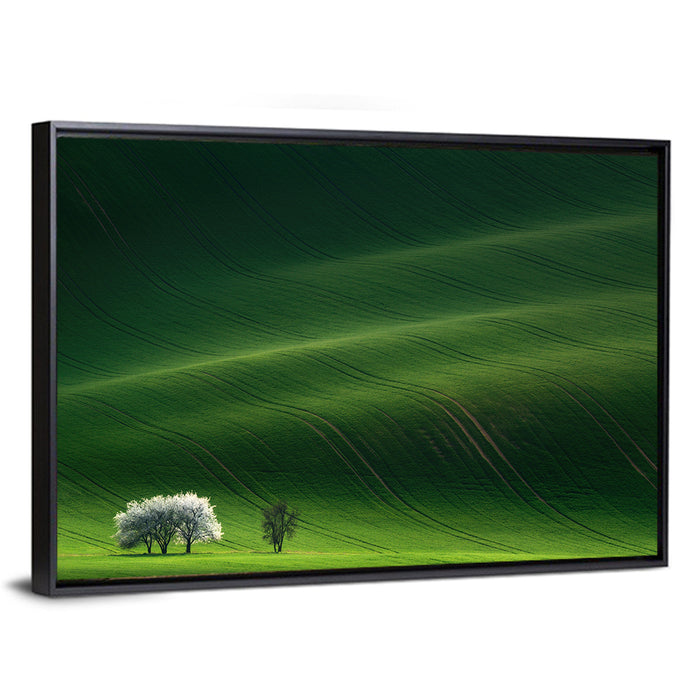 Emerald Hills with Blossoming Tree Wall Art as a framed canvas
