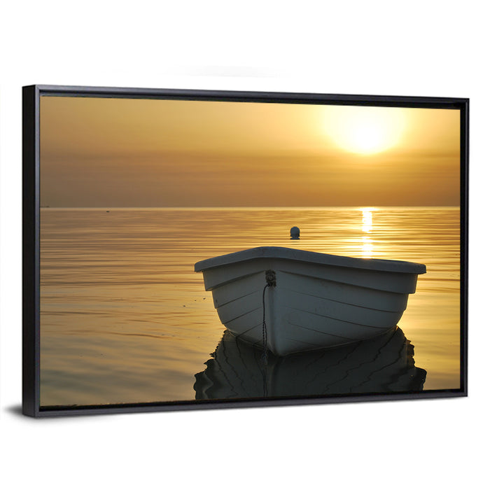 White Rowboat on Golden Sea Wall Art as a framed canvas