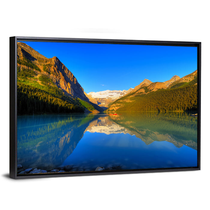 Lake Louise Canoe Reflection Wall Art as a framed canvas