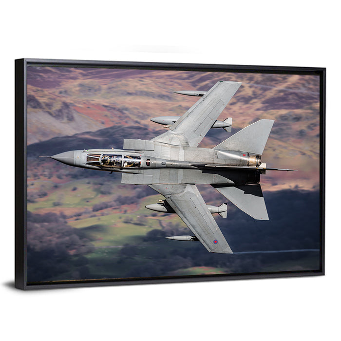 Swing-wing Fighter Jet Over Mountains Wall Art as a framed canvas