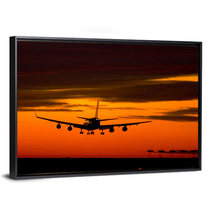 Airplane Landing at Sunset Wall Art