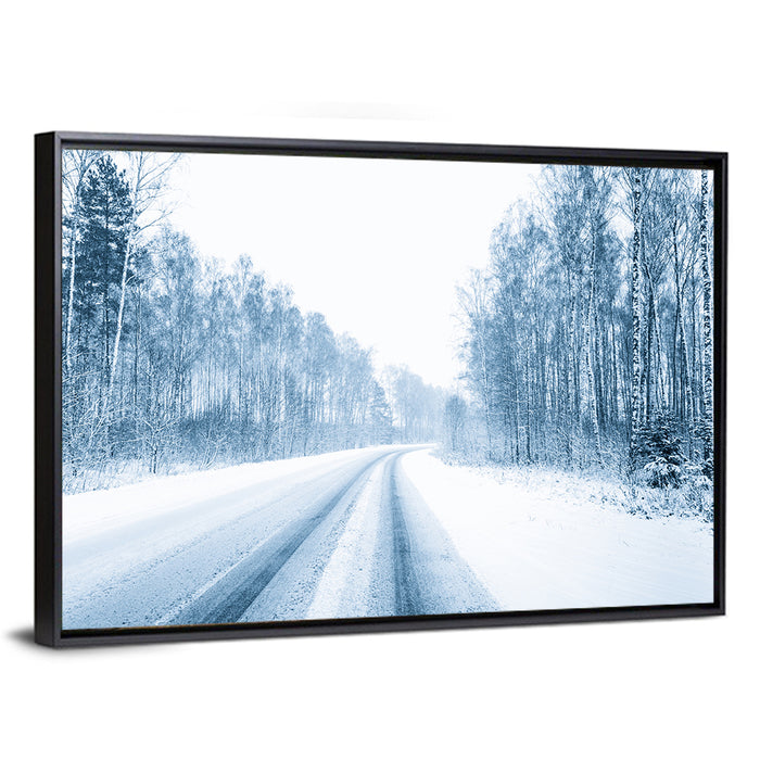 Tire Tracks on Snowy Road Wall Art as a framed canvas
