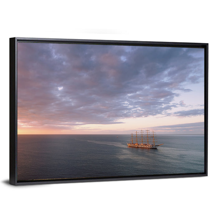 Sunlit Tall Ship at Sea Wall Art as a framed canvas