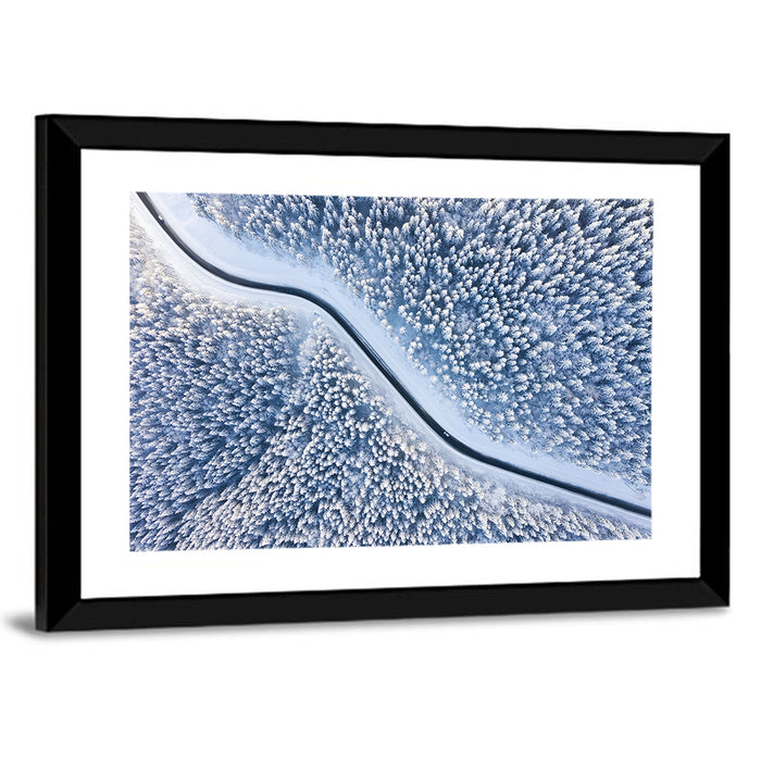 Winding Snowy Forest Road Wall Art as a framed print