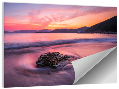 Pink Sunset Over Rock and Pier Wall Art