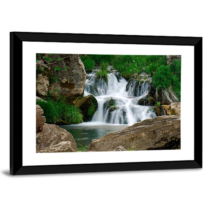 Moss Covered Rocky Waterfall Wall Art as a framed print