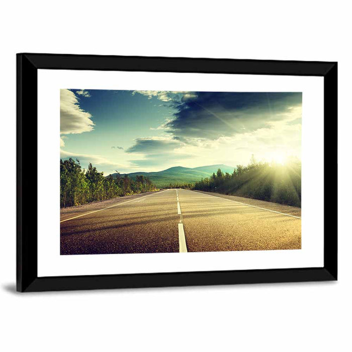 Sunlit Asphalt Road Wall Art as a framed print