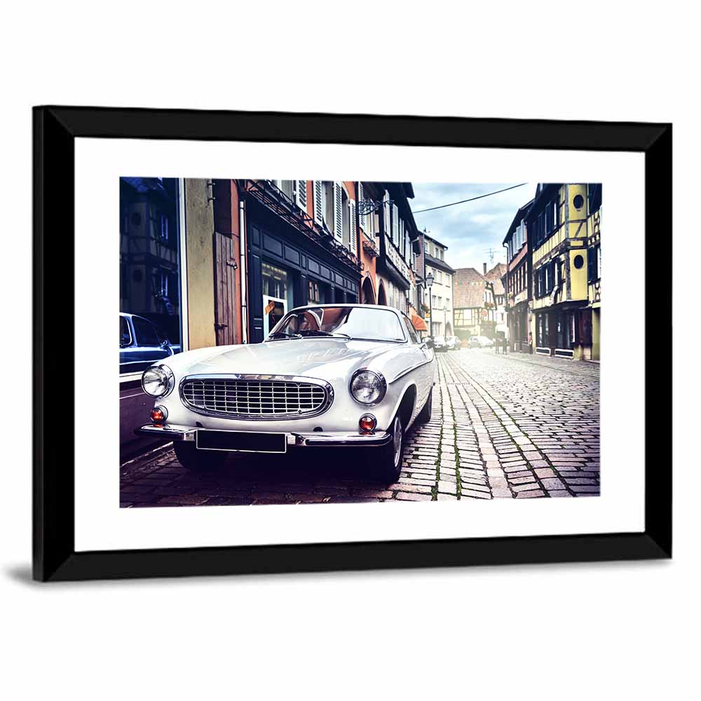 Vintage Car on Cobblestone Street Wall Art