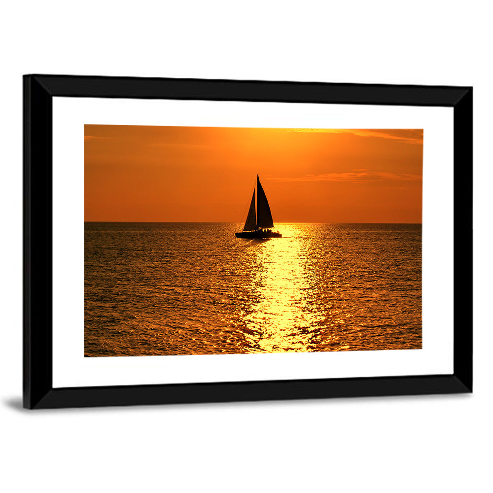 Sailboat Silhouette at Golden Sunset Wall Art