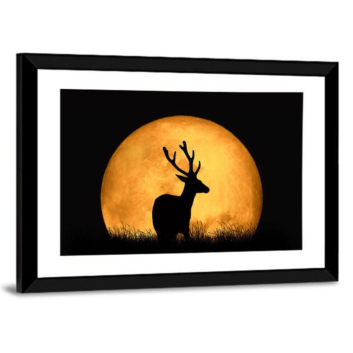 Buck Silhouette Under Red Moon Wall Art as a framed print