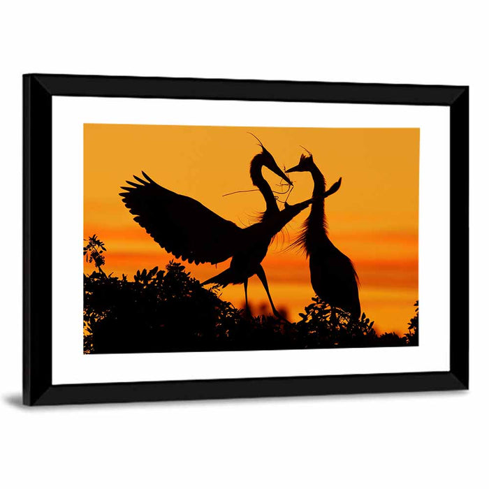 Heron Pair at Sunset Wall Art as a framed print