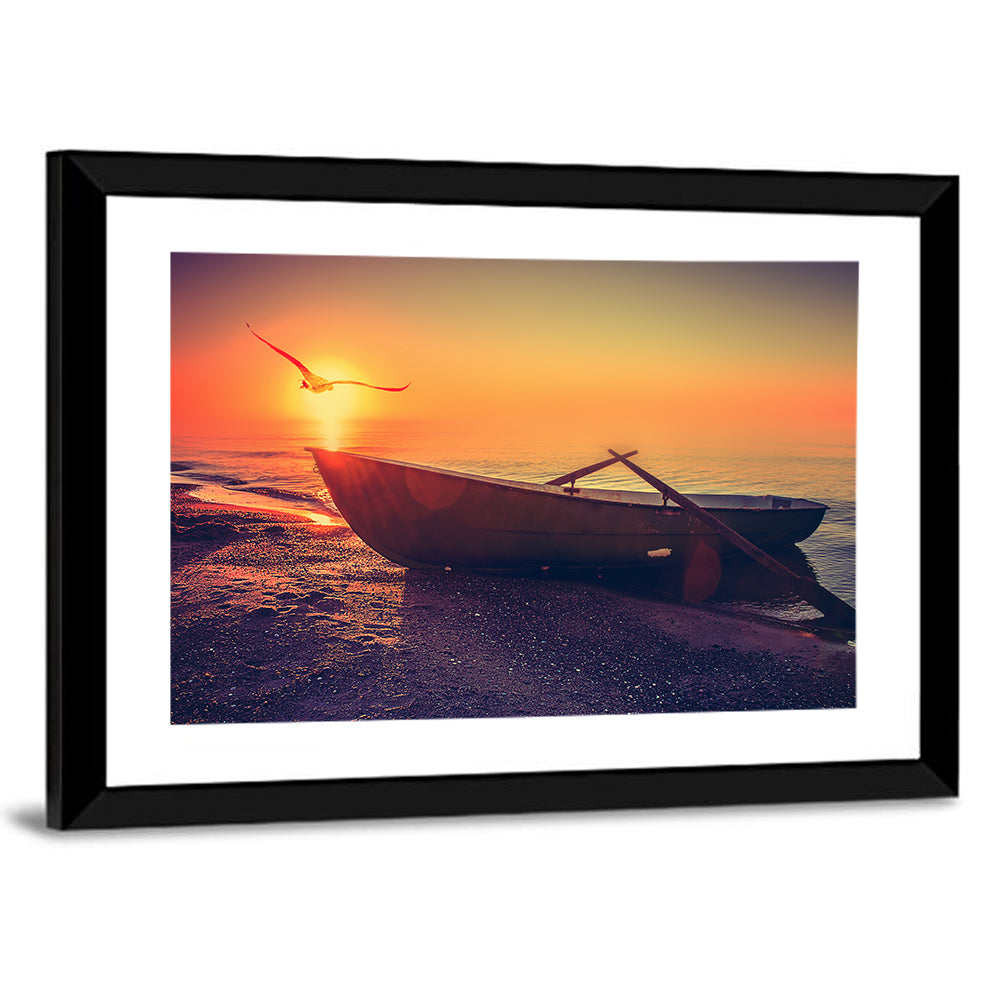 Sunset Rowboat on Sandy Shore Wall Art