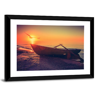 Sunset Rowboat on Sandy Shore Wall Art